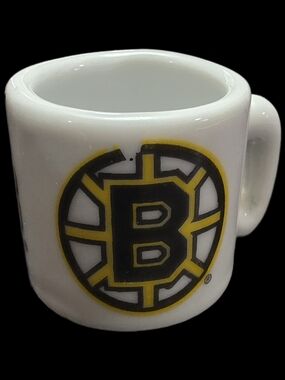 White Boston Bruins mini ceramic mug featuring the classic team logo
